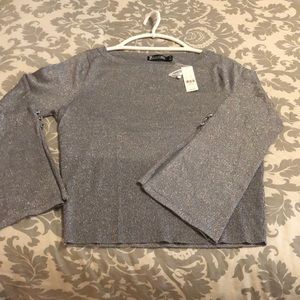 Bell sleeve sweaters one  **silver** and one black